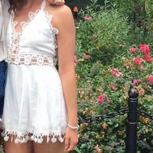 White romper with cutouts and tassels (size M)